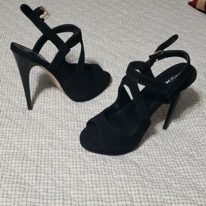 Black suede high heels